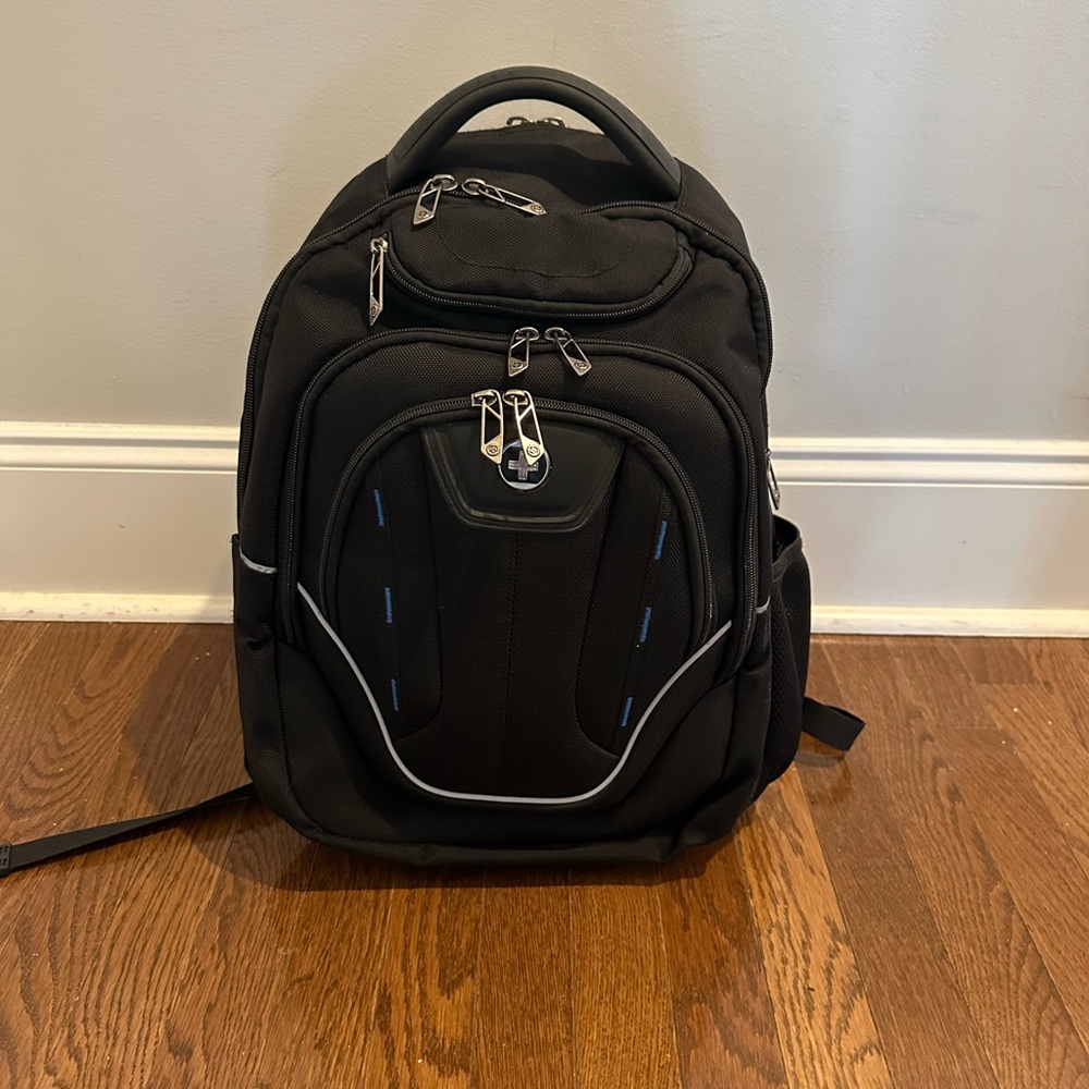 SwissGear Black Backpack with Contoured Shape and Metal Hardware